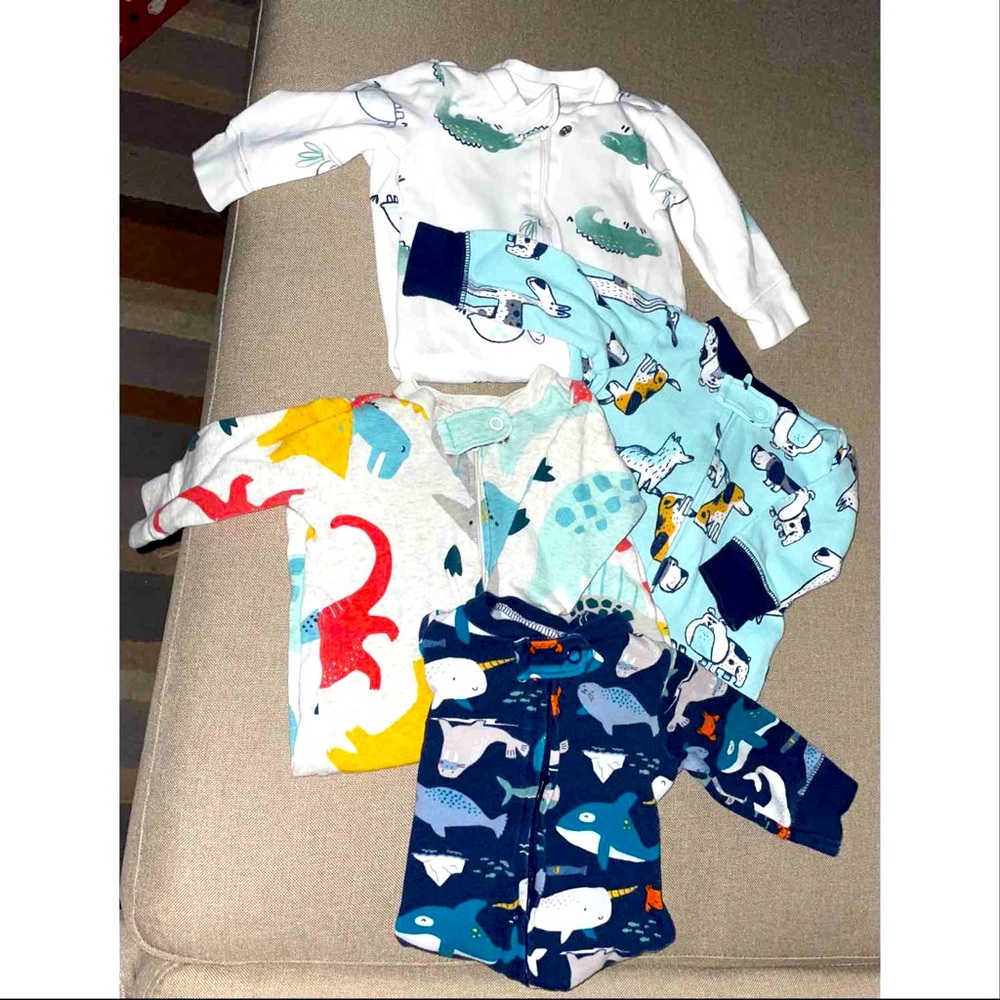 Lot of 4 Carter’s zip up footie pajamas Size 3M